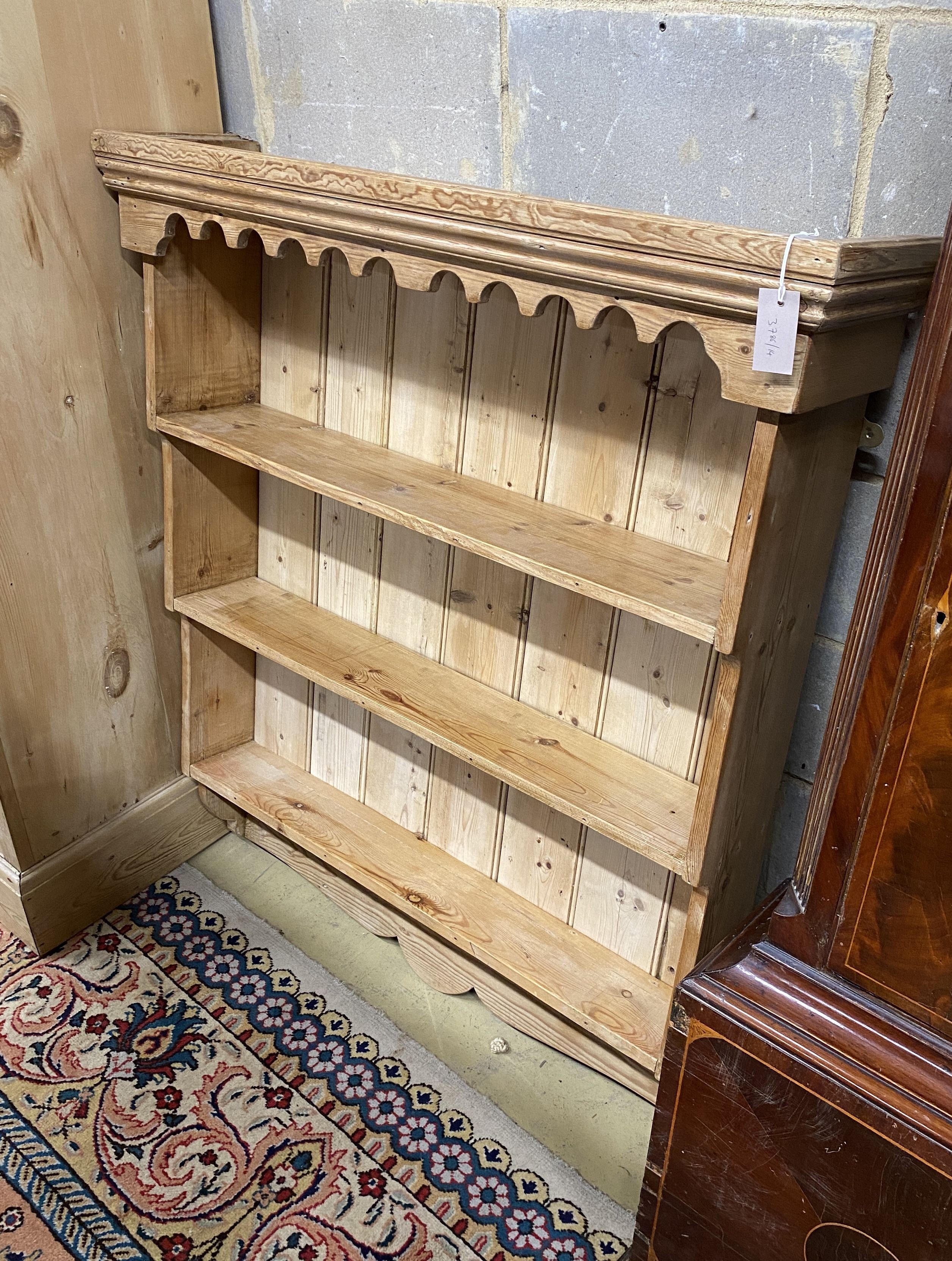 A Victorian style pine plate rack, length 104cm, depth 25cm, height 123cm